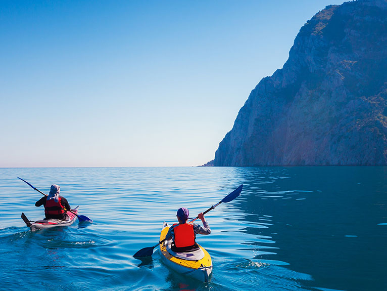 Kayaking along the coastline